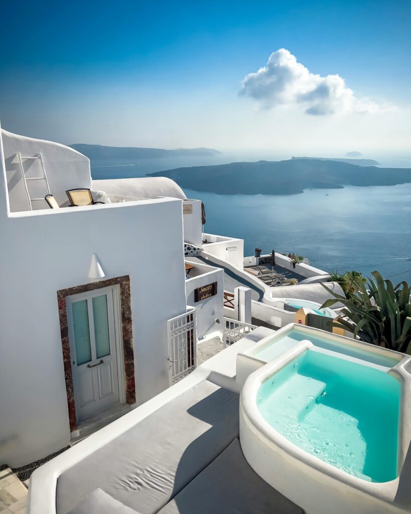 Charming Santorini scene featuring white architecture and stunning sea view.